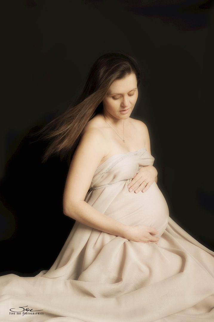 pregnant woman in white